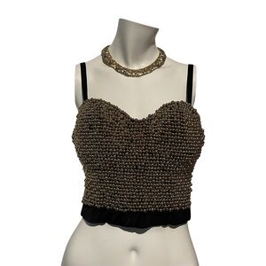 Black beaded corset top with gold accents
